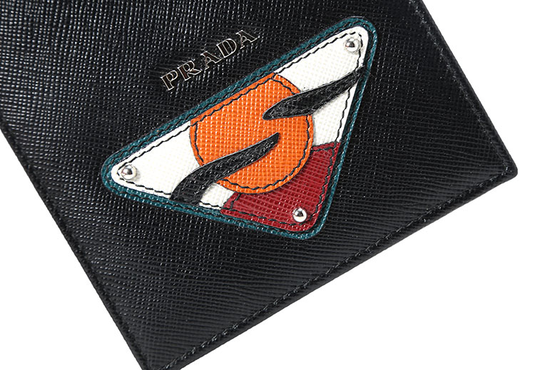 prada(普拉达) 黑色皮质太阳图案短款两折钱夹