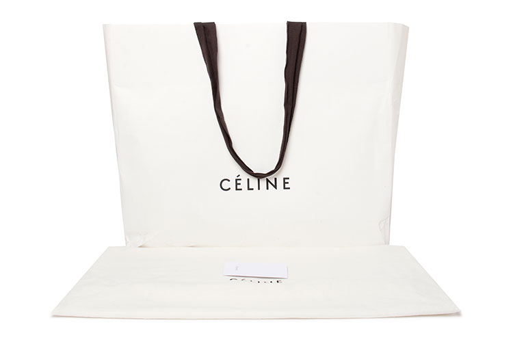 celine(赛琳) 黑色亮皮笑脸手提包