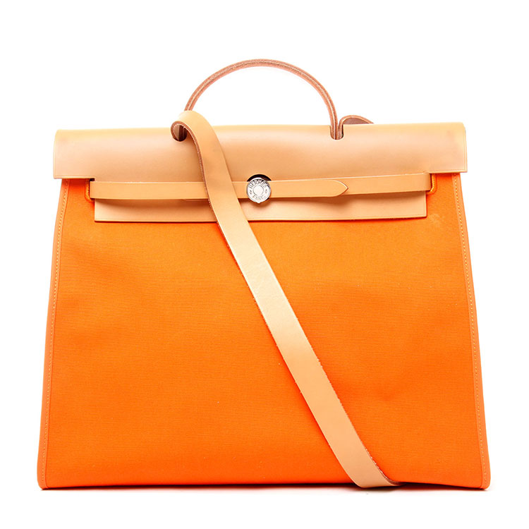 hermes(爱马仕) 橘色帆布斜挎包herbag39